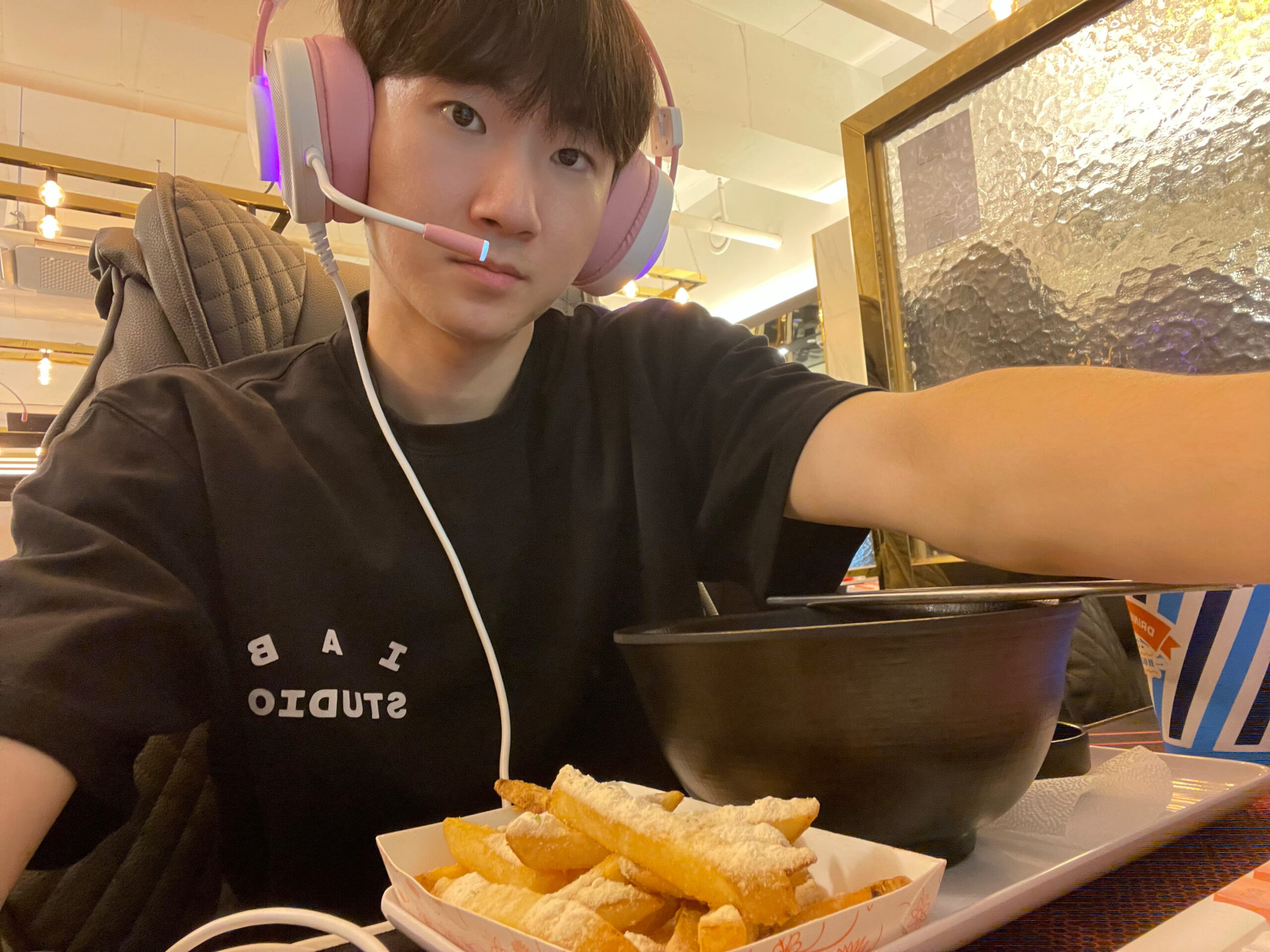 A DaeLee wearing a headset